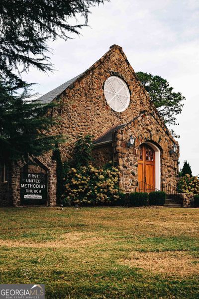 Front exterior of a new home in Mallard’s Landing, Jefferson, GA, highlighting curb appeal (Image 35).