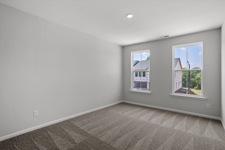 Spacious, unfurnished interior of a new home in Sweetbrier, Durham (Image 27).