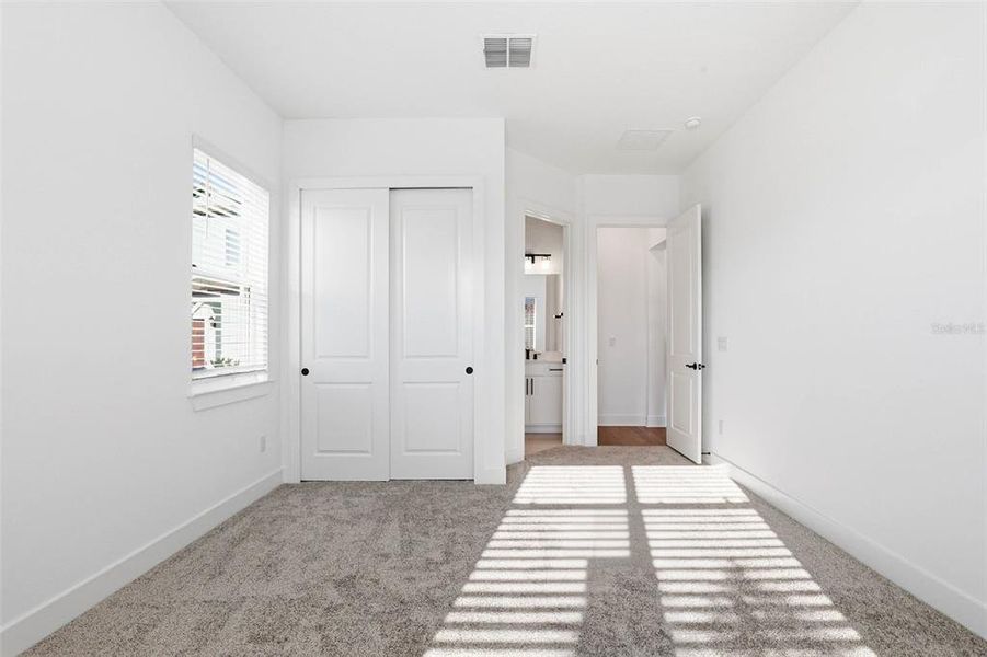 Spacious, unfurnished interior of a new home in Vida's Way, Wesley Chapel (Image 48).