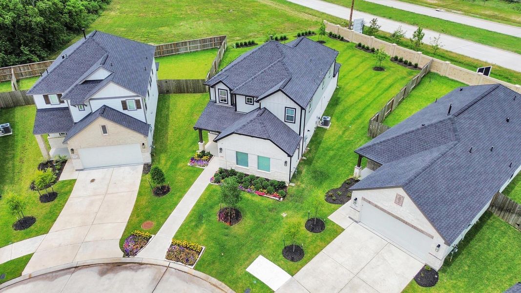 An aerial view of a spacious subdivision lot, highlighting a well-maintained yard and a fully fenced perimeter, offering both privacy and expansive outdoor space. An aerial view of a spacious subdivision lot, highlighting a well-maintained yard and a fully fenced perimeter, offering both privacy and expansive outdoor space.