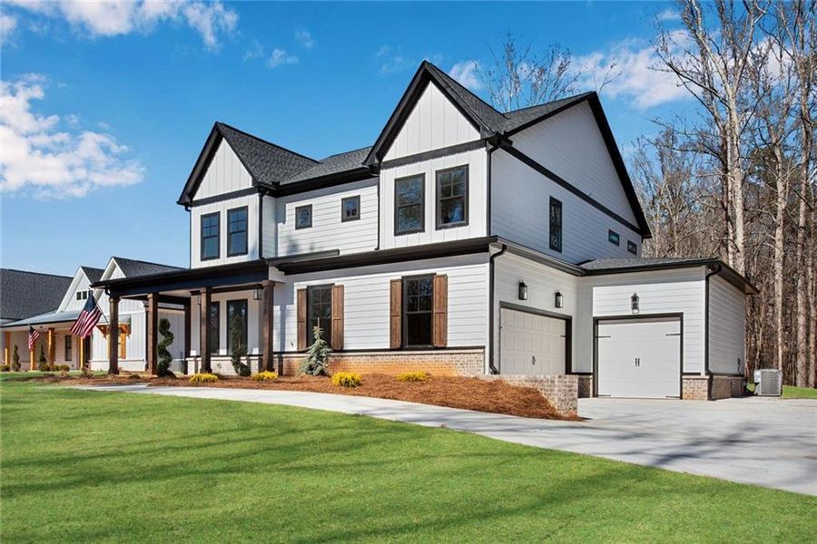 Front exterior of a new home in , Hiram, GA, highlighting curb appeal (Image 33). Front exterior of a new home in , Hiram, GA, highlighting curb appeal (Image 33).