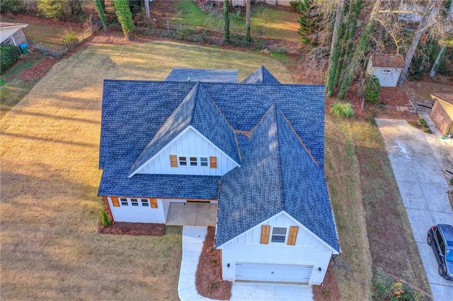 Front exterior of a new home in , Lawrenceville, GA, highlighting curb appeal (Image 30).