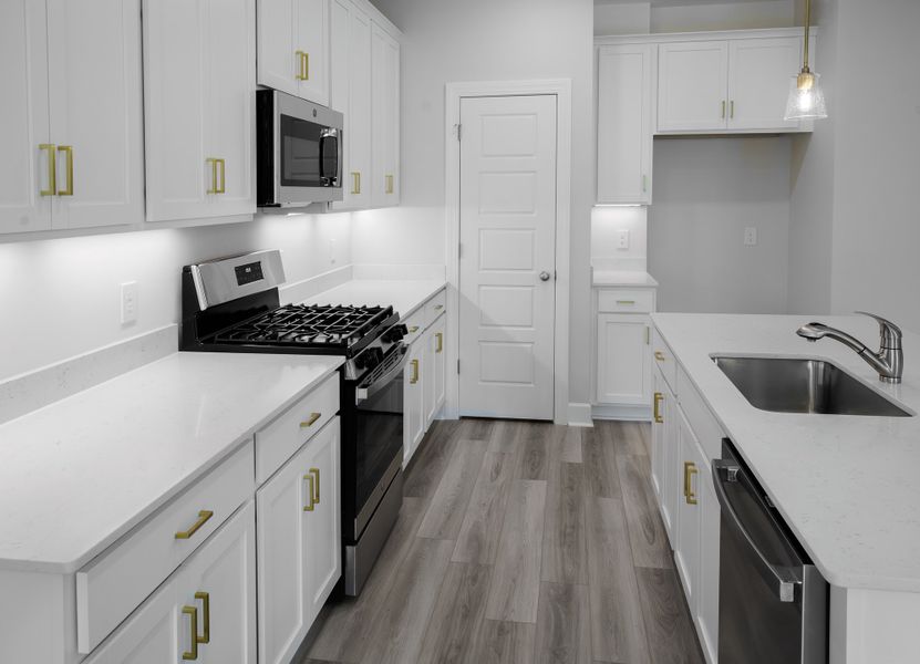 Representative furnished interior of a home built from the The McKee Manor by Cothran Homes in Holly Ridge, Greenville (Image 7). Representative furnished interior of a home built from the The McKee Manor by Cothran Homes in Holly Ridge, Greenville (Image 7).