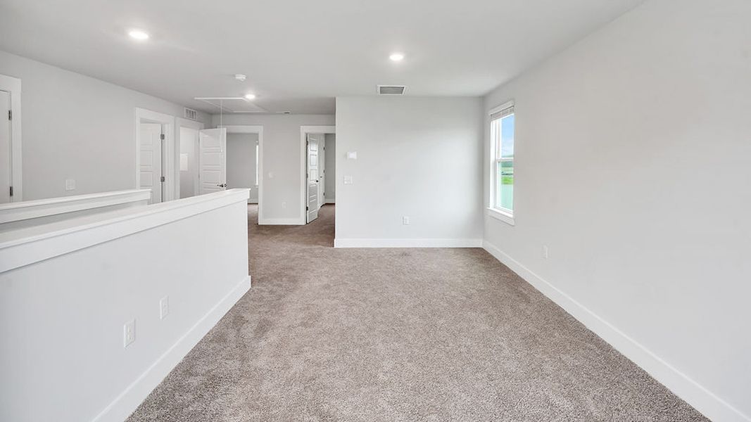 Spacious, unfurnished interior of a new home in The Landing at Sidbury Station, Castle Hayne (Image 24).