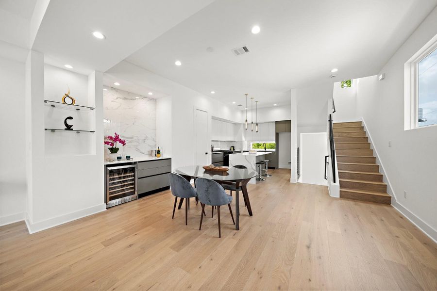 A bright and modern open-concept design enhanced by the warmth and elegance of European white oak engineering wood floors. A bright and modern open-concept design enhanced by the warmth and elegance of European white oak engineering wood floors.
