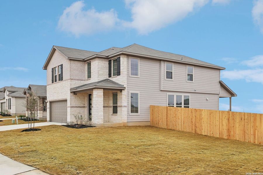 Exterior details and patio area of a home in Lark Canyon, New Braunfels (Image 25).
