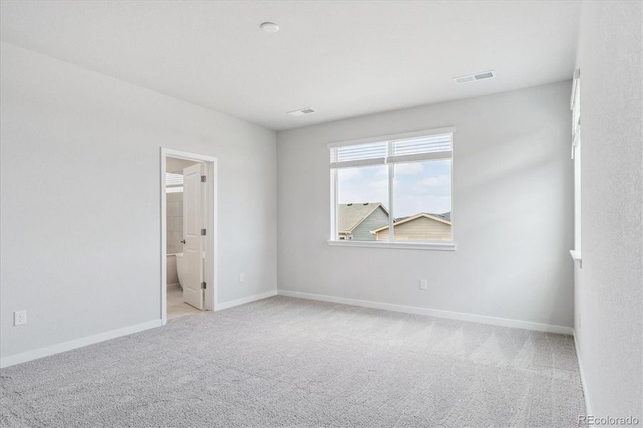 Spacious, unfurnished interior of a new home in Floret Collection at Alder Creek, Parker (Image 22).