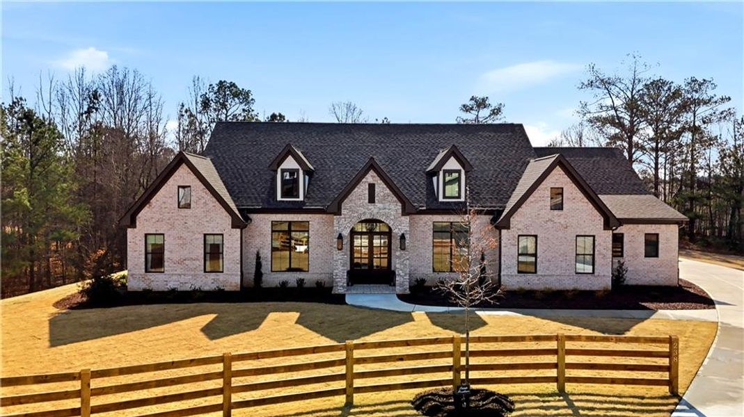 Front exterior of a new home in , Woodstock, GA, highlighting curb appeal (Image 2). Front exterior of a new home in , Woodstock, GA, highlighting curb appeal (Image 2).