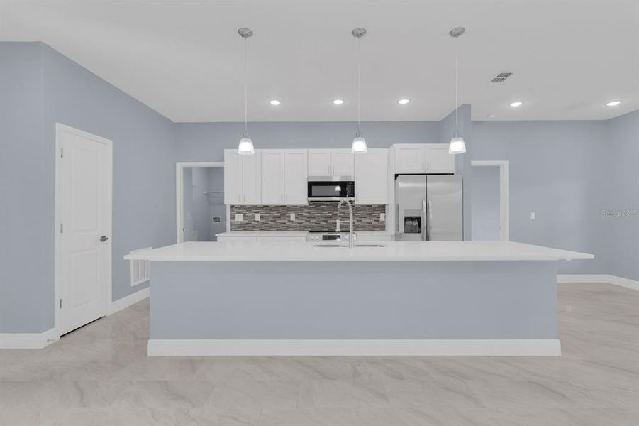 Furnished interior view inside a new home in , Kissimmee (Image 7).