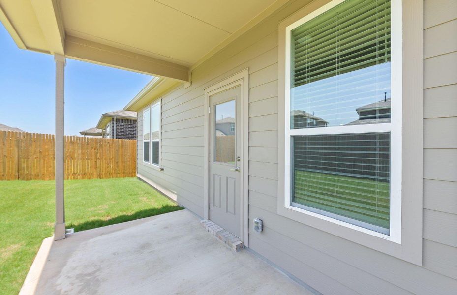 Exterior details and patio area of a home in Crosswinds, Kyle (Image 19).