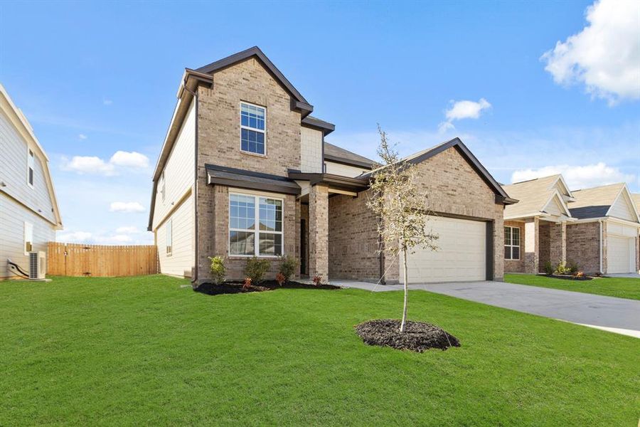Front exterior of a new home in Deer Creek, Crowley, TX, highlighting curb appeal (Image 2).