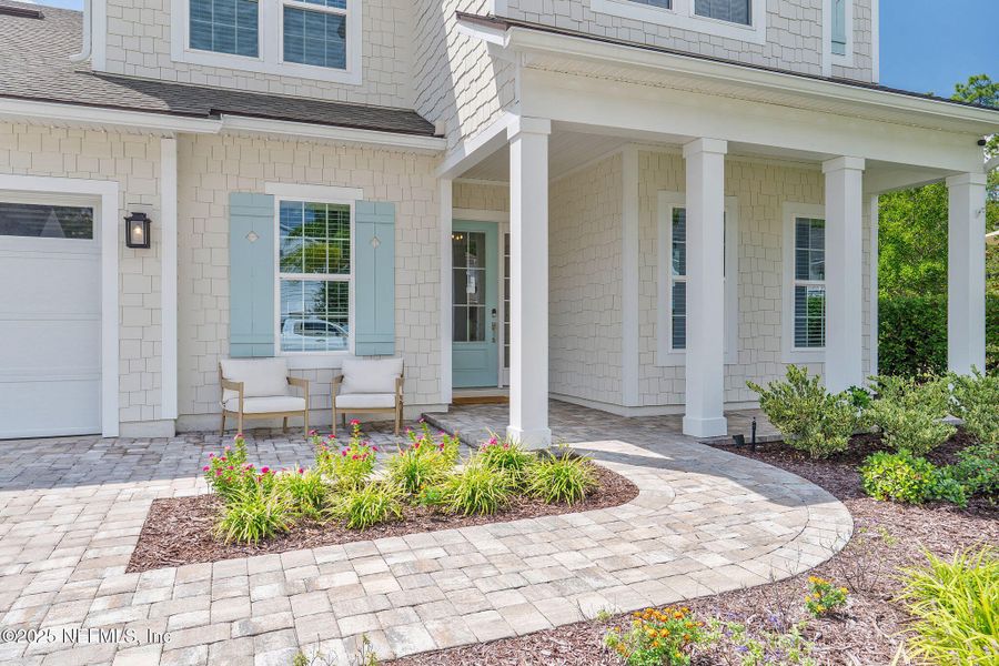 Front exterior of a new home in Palm Crest AT Seabrook, Ponte Vedra, FL, highlighting curb appeal (Image 28).