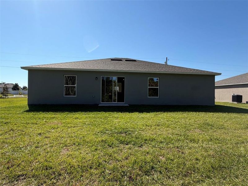 Exterior details and patio area of a home in Poinciana, Poinciana (Image 3).