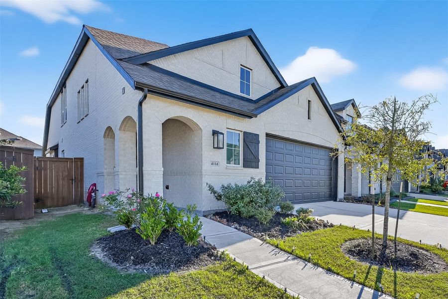 Front exterior of a new home in , Arcola, TX, highlighting curb appeal (Image 21).