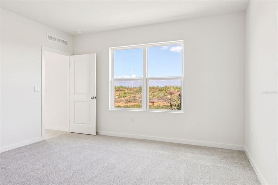 Spacious, unfurnished interior of a new home in Hamilton Bluff, Haines City (Image 27).