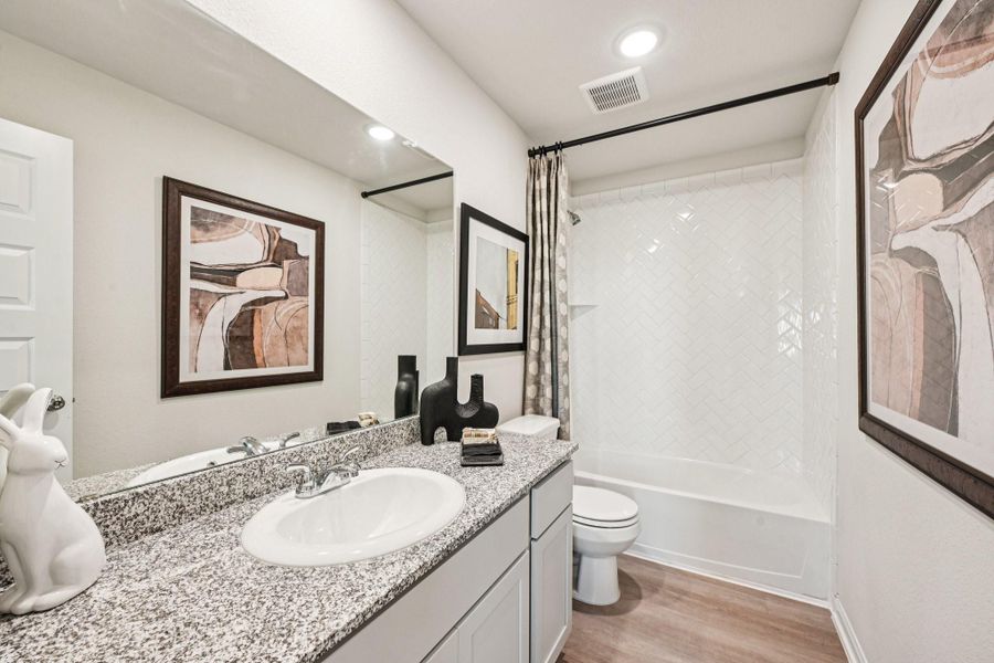 Furnished interior view inside a new home in The Landing, New Caney (Image 25).
