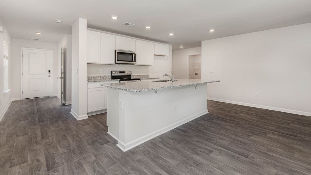Representative furnished interior of a home built from the WREN by D.R. Horton in Cedar Hill Landing, Navassa (Image 4).