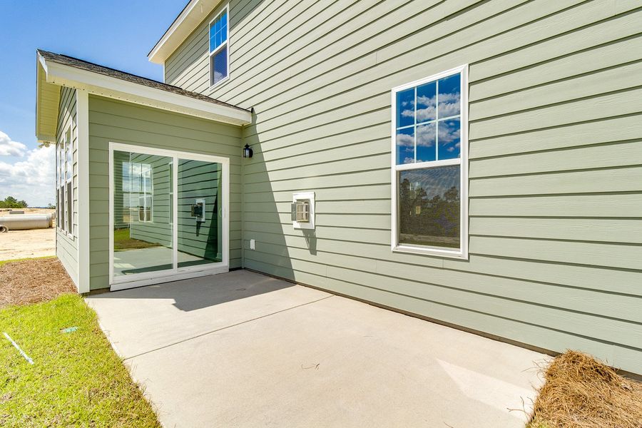 Exterior details and patio area of a home in Gates at Windermere, Blythewood (Image 4).