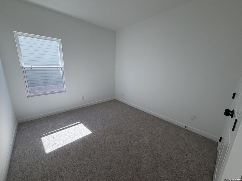 Spacious, unfurnished interior of a new home in The Wilder, Adkins (Image 24).