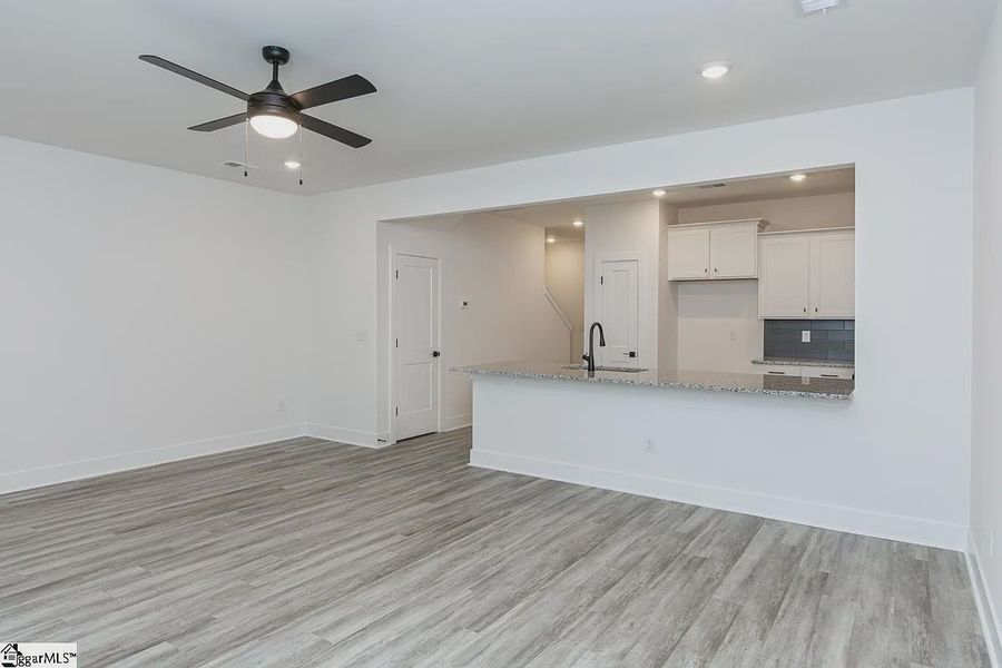 Representative unfurnished interior of a home built from the 1568 Townhome by Adams Homes in Parkstone Place Townhomes, Roebuck (Image 10). Representative unfurnished interior of a home built from the 1568 Townhome by Adams Homes in Parkstone Place Townhomes, Roebuck (Image 10).