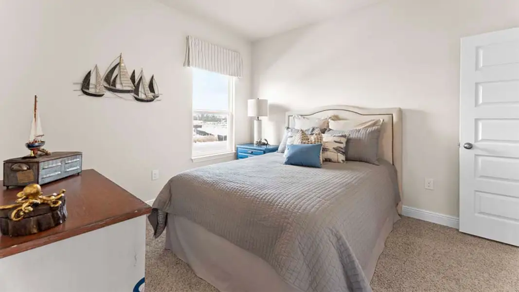 Representative furnished interior of a home built from the The Camden by D.R. Horton in Liberty, Panama City (Image 8).