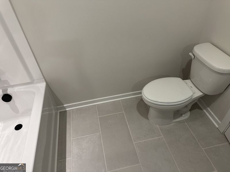 Furnished interior view inside a new home in Millstone at Mundy Mill, Gainesville (Image 28).