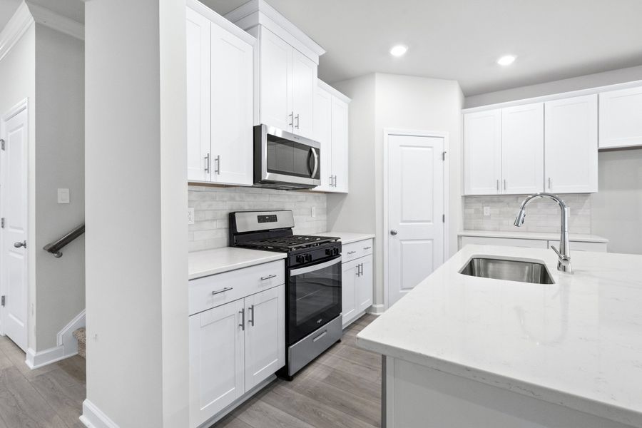 Furnished interior view inside a new home in Waterside - Coastline Series, Longs (Image 7).