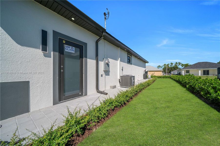Exterior details and patio area of a home in , Lehigh Acres (Image 26). Exterior details and patio area of a home in , Lehigh Acres (Image 26).