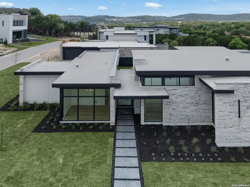 Front exterior of a new home in , San Antonio, TX, highlighting curb appeal (Image 1). Front exterior of a new home in , San Antonio, TX, highlighting curb appeal (Image 1).