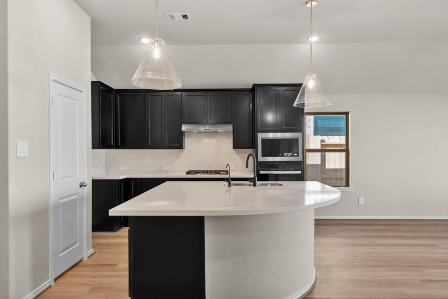 Furnished interior view inside a new home in The Highlands 45', Porter (Image 7).