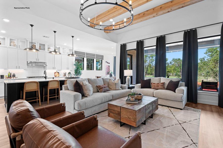 As you wander through the open floor plan, you’ll notice high ceilings that elevate the ambiance, while carefully chosen materials add a touch of luxury without losing that cozy feel.
