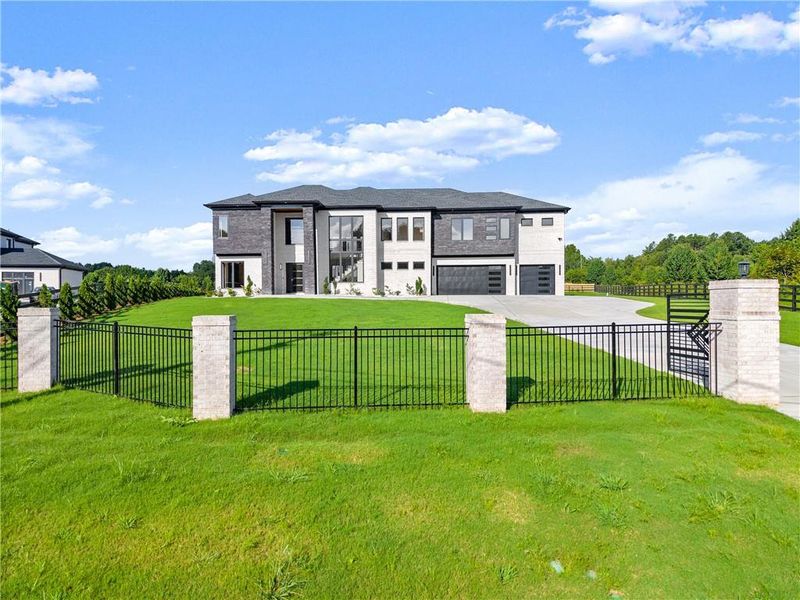 Front exterior of a new home in , Dacula, GA, highlighting curb appeal (Image 25).