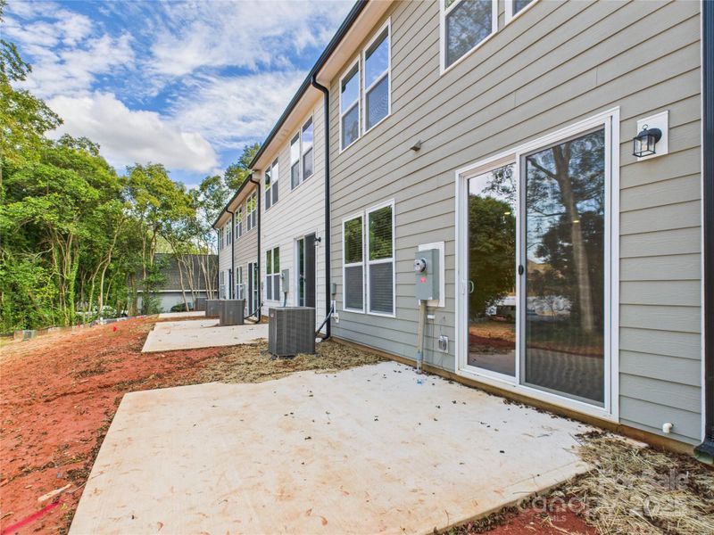 Private patio has vinyl fencing between lots Private patio has vinyl fencing between lots