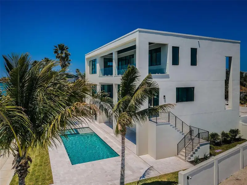 Exterior details and patio area of a home in , Belleair Beach (Image 3).