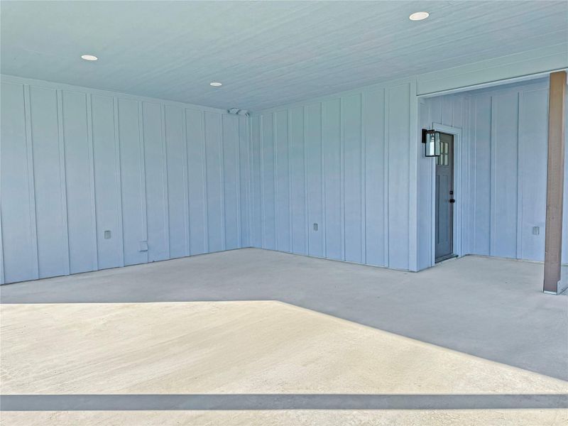 2 car attached carport featuring recessed lighting