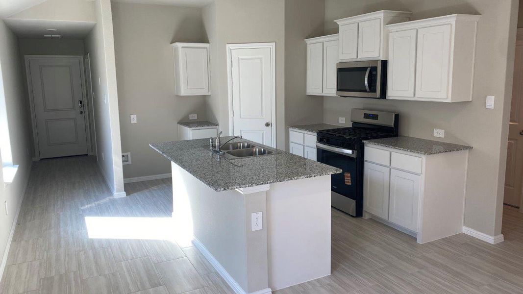 Furnished interior view inside a new home in Springhill South, Boyd (Image 5). Furnished interior view inside a new home in Springhill South, Boyd (Image 5).