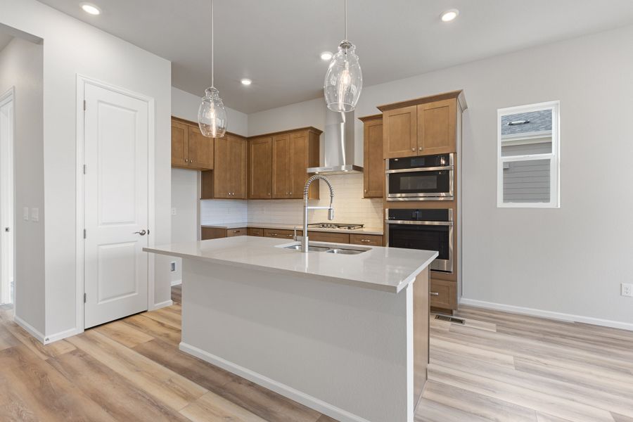 Furnished interior view inside a new home in The Manors Collection at Golden Overlook, Lakewood (Image 5).