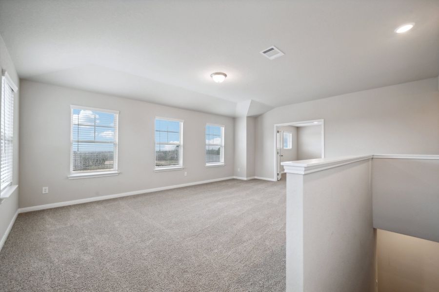 Second floor landing in the Reynolds floorplan at a Meritage Homes community.