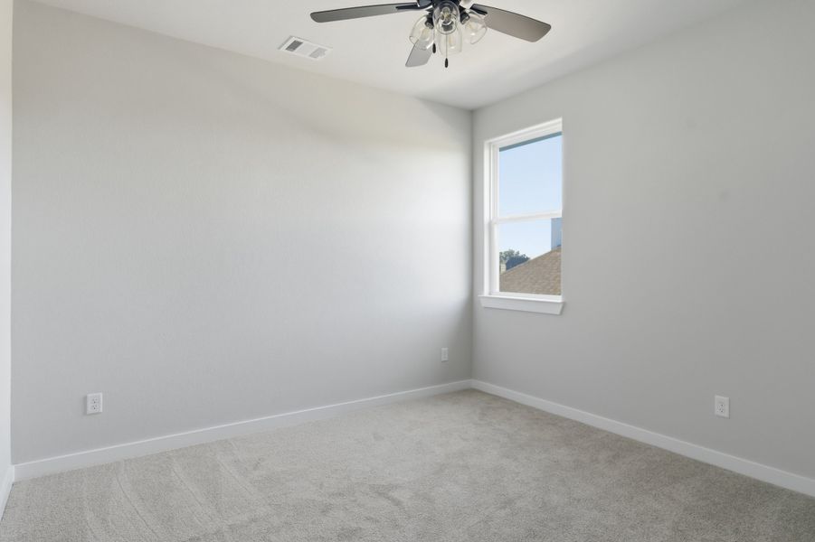 Spacious, unfurnished interior of a new home in Mission Ranch, College Station (Image 21).