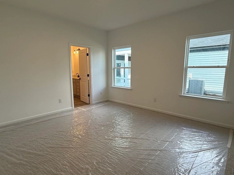 Primary Bed featuring the AW Collection® Artisan - Soft layers and natural tones for everyday rest and retreat. Primary Bed featuring the AW Collection® Artisan - Soft layers and natural tones for everyday rest and retreat.