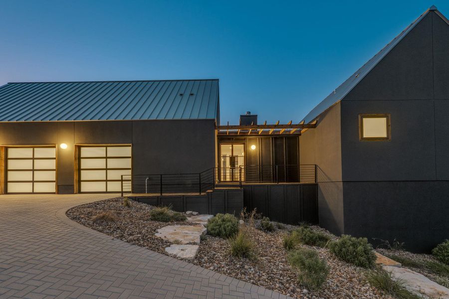 Front exterior of a new home in , Austin, TX, highlighting curb appeal (Image 1). Front exterior of a new home in , Austin, TX, highlighting curb appeal (Image 1).