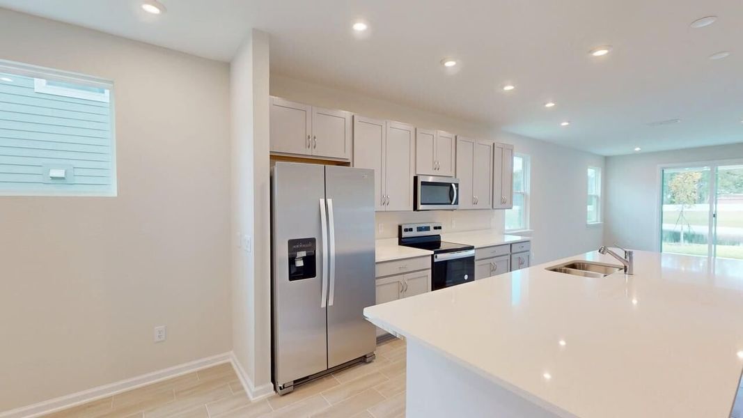 Furnished interior view inside a new home in Sandridge Hills, Green Cove Springs (Image 3).