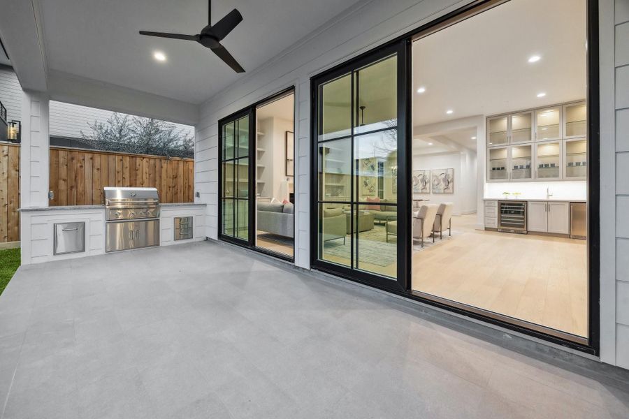 Covered patio with an outdoor kitchen.