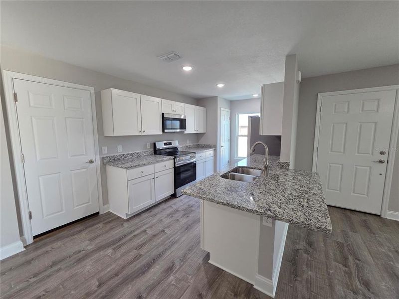 Furnished interior view inside a new home in , Lake Wales (Image 14).
