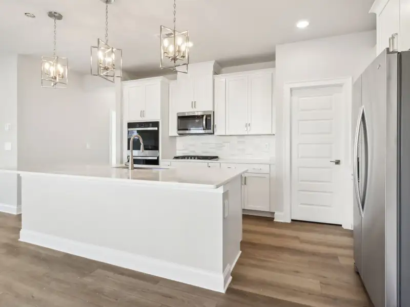 Furnished interior view inside a new home in Avalon - Reserve Series, Conyers (Image 4).