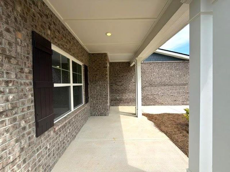 Exterior details and patio area of a home in Tuscany Hills, Douglasville (Image 19).