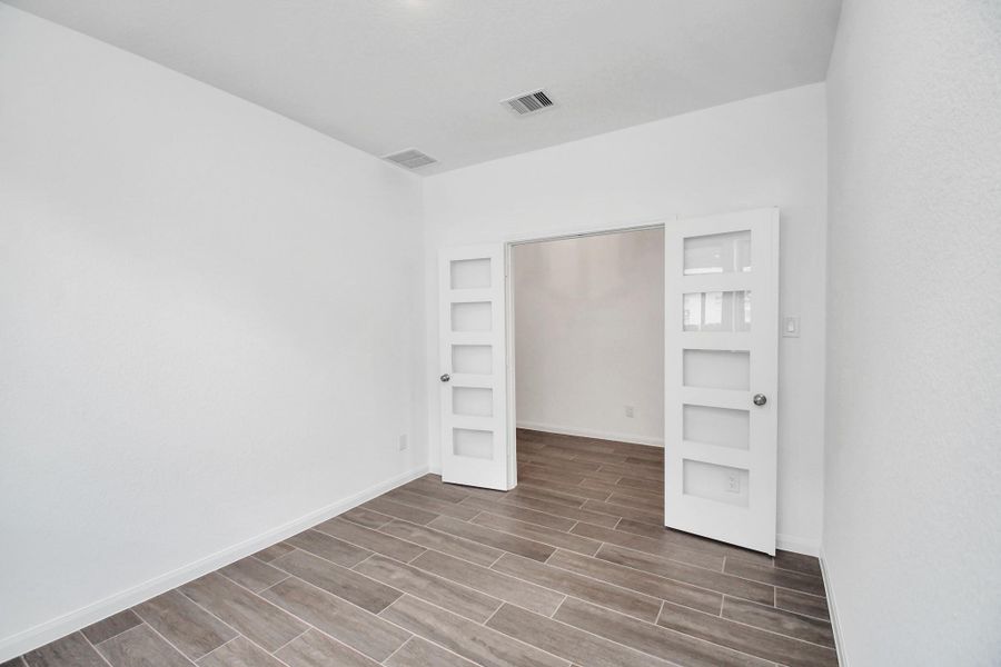 Spacious, unfurnished interior of a new home in 50' Traditional Homes at Elyson, Katy (Image 18).