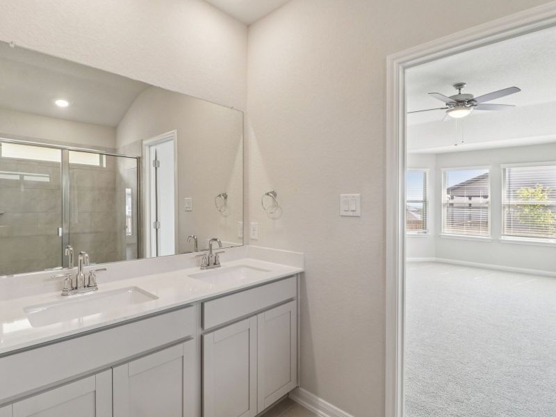 Primary suite bathroom in the Callaghan floorplan at a Meritage Homes community.