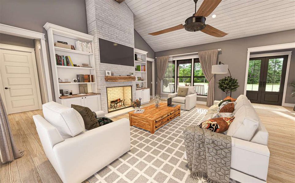 This open concept home features vaulted ceilings, wood burning fireplace, and several windows for natural light to shine in!