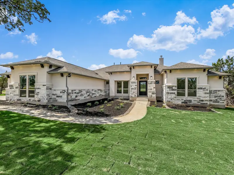 Representative exterior photo of a completed home built from the Santa Monica by Giddens Homes in Clearwater Ranch, Liberty Hill, TX (Image 27). Representative exterior photo of a completed home built from the Santa Monica by Giddens Homes in Clearwater Ranch, Liberty Hill, TX (Image 27).